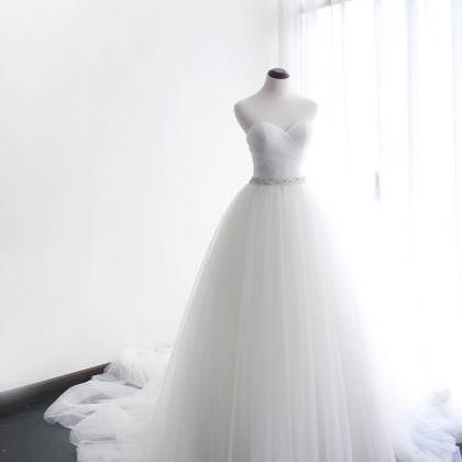 Strapless Sweetheart Ruched Beaded Tulle Ball Gown..