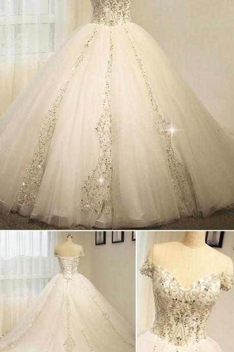 Brilliant Tulle Off-the-shoulder Neckline Ball Gown Wedding Dress With Beaded Embroidery
