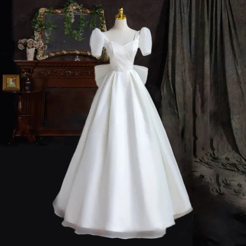 Chic White Gown With Statement Bow Detail on Luulla
